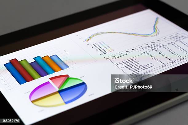 Digital Tablet With Graphics And Charts Stock Photo - Download Image Now - Analyzing, Business, Chart