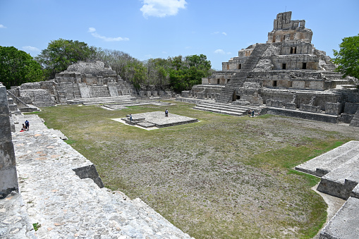 Mysterious Maya sites, unesco world heritage, with the ruins of temples, houses and altars. Not crowded. Sunny warm summer days with blue sky