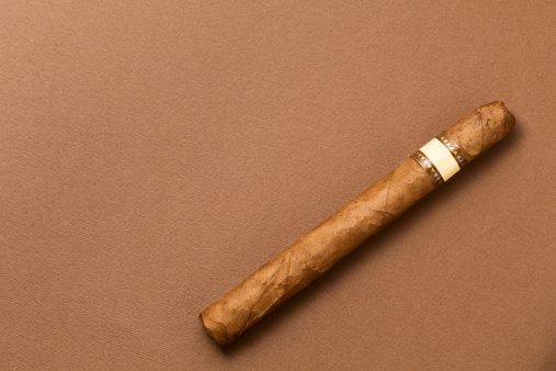 Cigars on brawn background