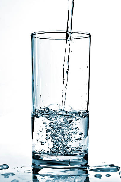 istock Cold water being poured into a glass. 165053903