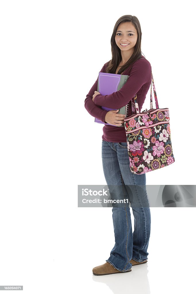 Asian Teen with Notebooks and Book Bag Charming teenager holding her books and book bag. Full length composition, studio shot isolated on white background. Model is mixed race asian and american ethnicities. Asian and Indian Ethnicities Stock Photo
