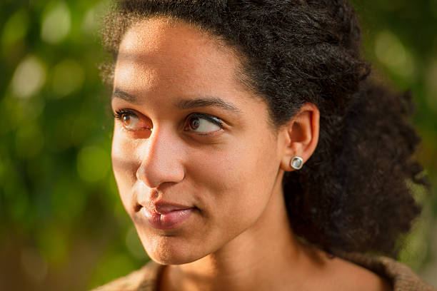 istock Beautiful Young Woman's Portrait (Sunlight Effect) 165054269