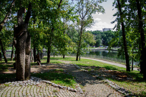 istock Leisure park area with trees and green lawn 1650548581
