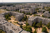 Drone photography of apartment flat complex in a city near a park