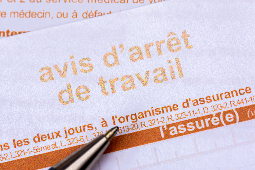 Clamart, France - August 19, 2023: Close-up of an official sick leave form from the French social security that the doctor gives to patients when they are unable to work