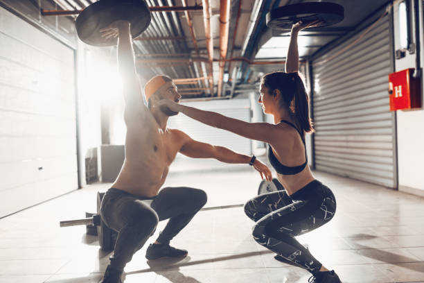 istock Couple At The Cross Training 1650583614