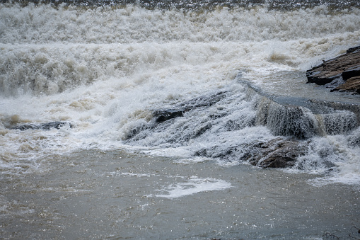 Close-up of a flood flowing through a river channel