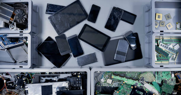 istock Mobile phones and digital tablets on desk 1650609157