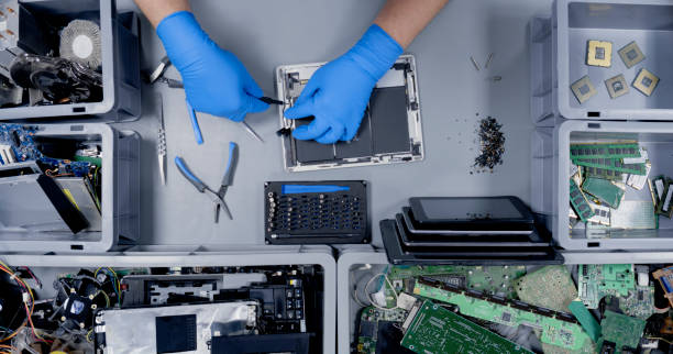 istock Repairman repairing digital tablet 1650609164