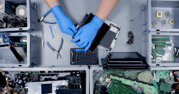 istock Repairman repairing digital tablet 1650609171