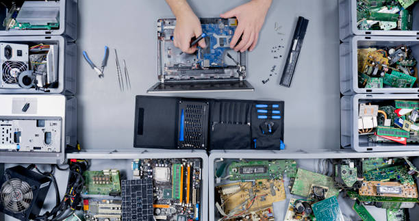 istock Repairman repairing laptop 1650609172
