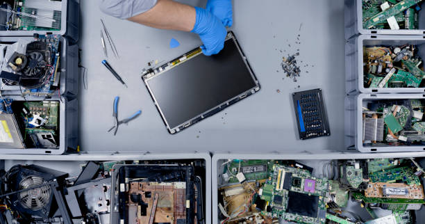istock Repairman repairing laptop screen 1650609175