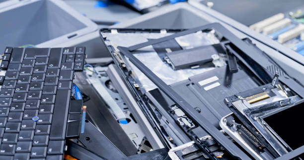 istock Keyboard and computer parts in tray 1650609184
