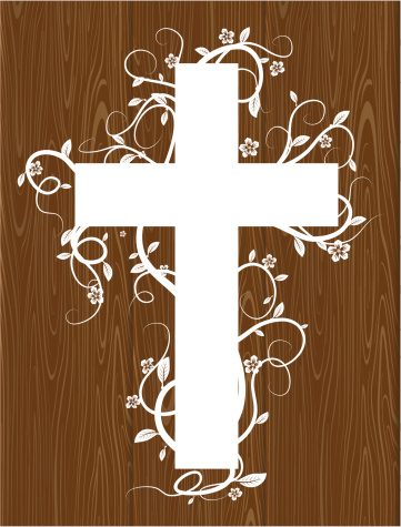 cross on a wood pattern with lots of vines and leafs and flowers