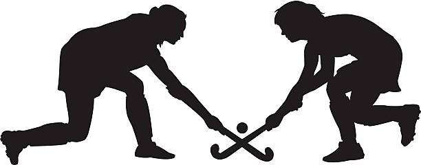 Field Hockey Vector illustration of two field hockey players in a face off. field hockey stock illustrations