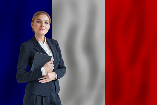 French businesswoman on the flag of France digital  nomad, business, startup concept