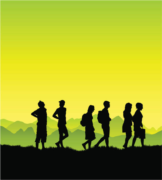 Friends on a walk in the country A group of friends walking through the country. good looking man looking up stock illustrations
