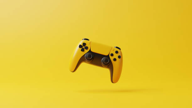 istock Flying gamepad on a yellow background with copy space 1650675494