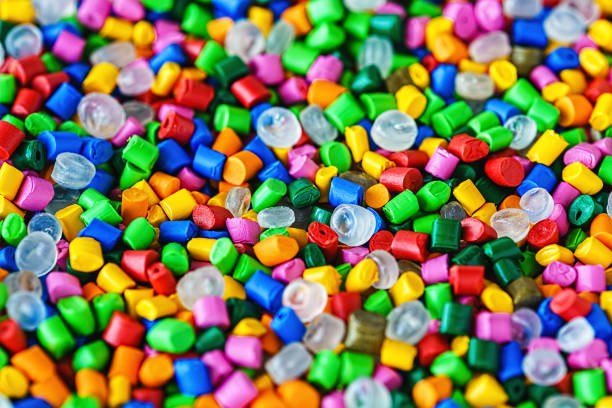 istock background from colored plastic granules macro shot. abstract background from plastic dye 1650675701