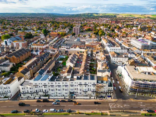 Aerial view, taken by drone, depicting the architecture on the seafront in the town of Worthing in the southeast of England, UK.