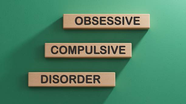 istock Obsessive Compulsive Disorder words on wooden blocks. Psychiatry psychological problem concept, OCD.3D rendering on green background. 1650684600