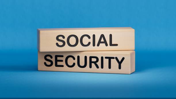 Time to social security symbol. Concept words Social security on wooden blocks. Business and social security concept. Copy space.3D rendering on blue background. Time to social security symbol. Concept words Social security on wooden blocks. Business and social security concept. Copy space.3D rendering on blue background. ficaria verna stock pictures, royalty-free photos & images