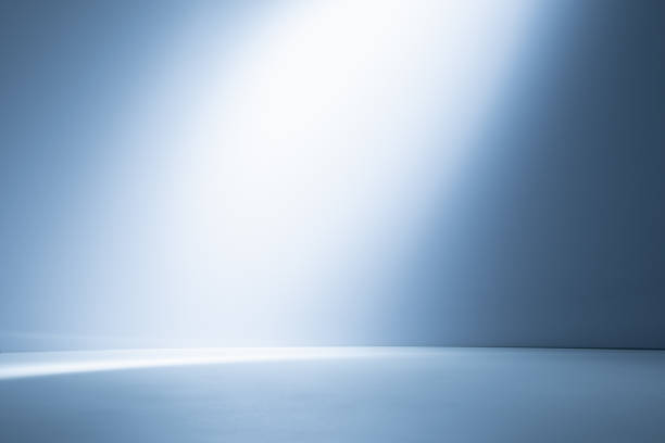 istock Empty light blue background for product presentation with light and shadow on the wall and floor 1650756892