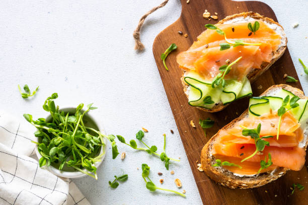 istock Open sandwich with cream cheese, salmon and cucumber. 1650768976