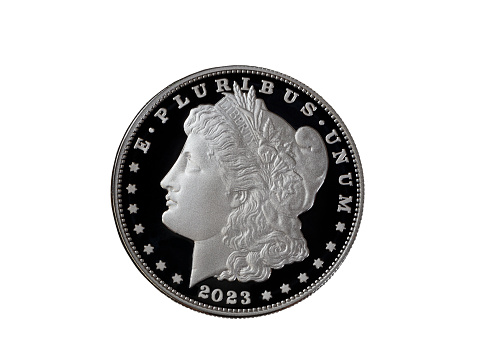 2023 Obverse side of Morgan silver dollar in reverse proof format isolated on a white background