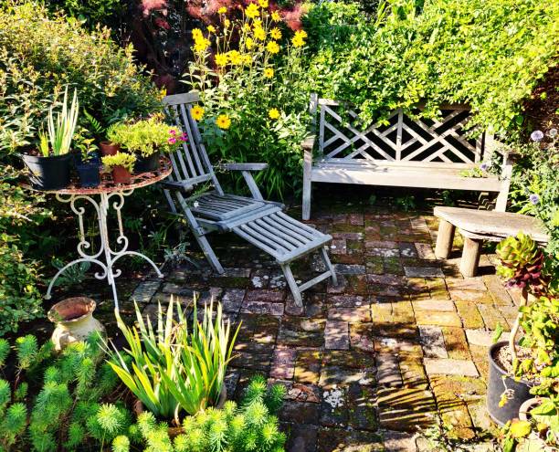 istock Shady patio in a cottage garden. 1650772845
