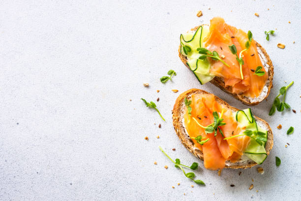 Open sandwich with cream cheese, salmon and cucumber.