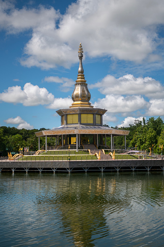 Beautiful pavilion in the middle of pool at  Wat Pa Kung Temple or Wat Prachakom Wanaram in Si Somdet district, Roi Et Province, northeast of Thailand.