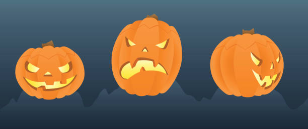 Three Halloween Pumpkins vector art illustration