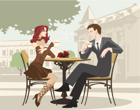 Portrait of Couple Drinking Coffee at Outdoor Cafe