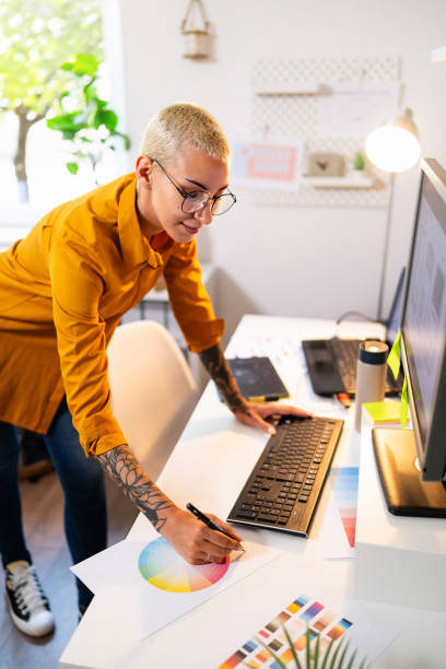 Young woman working at her home office