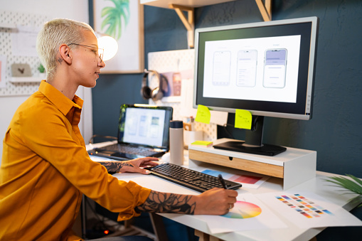 Young woman working at her home office.