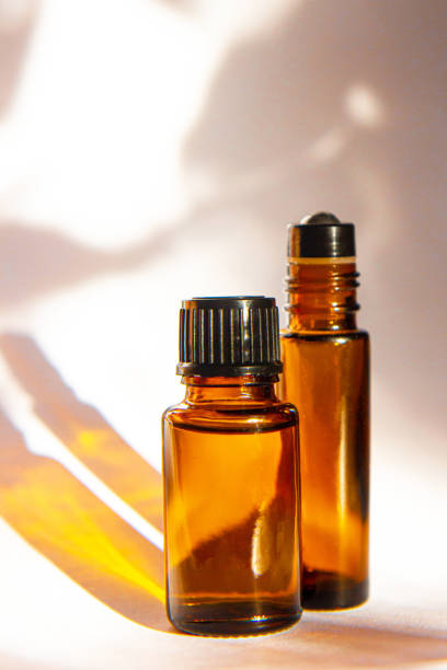 istock Empty glass miniature bottles on white background. Modern apothecary concept 1650798606
