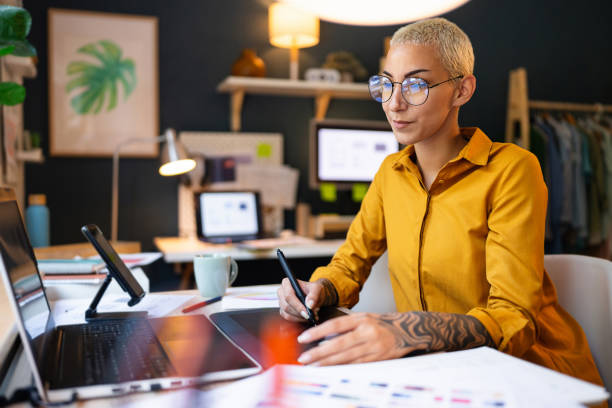 Young woman working at her home office.