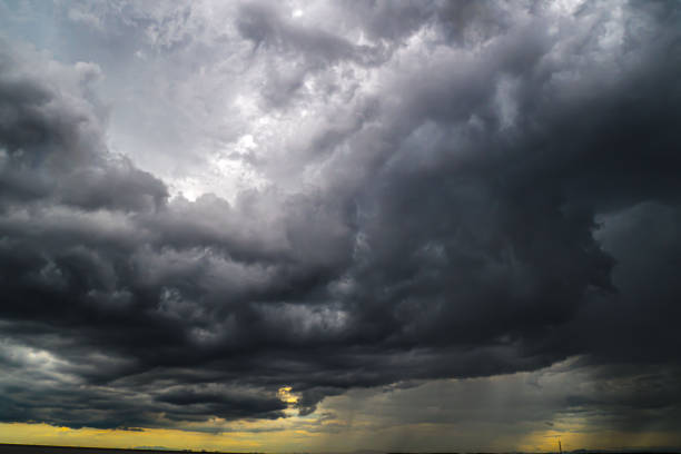 istock Storm Clouds Over Cold Sea Water. Stylized panoramic seascape. Dramatic sky over sea 1650801772