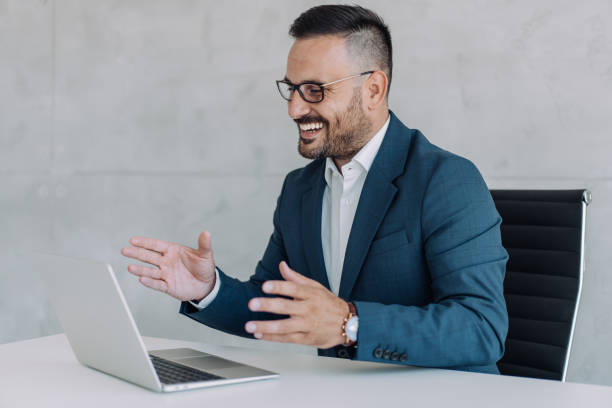 istock Businessman having video call in the office. 1650830493