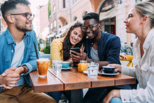 istock Young friends enjoying a coffee together. 1650831053
