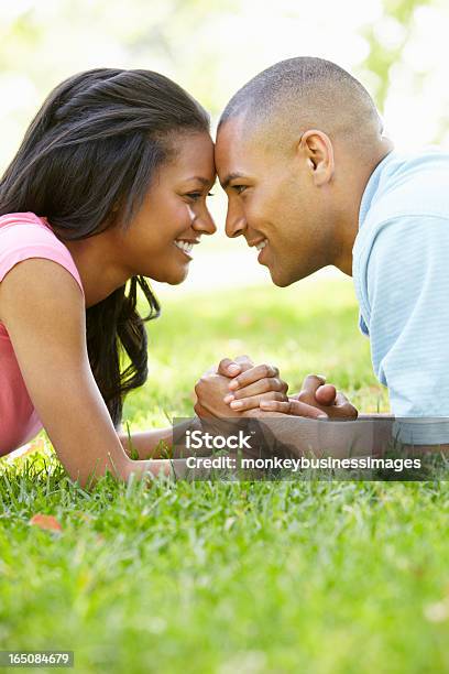 Portrait Of Romantic Young African American Couple In Park Stock Photo - Download Image Now