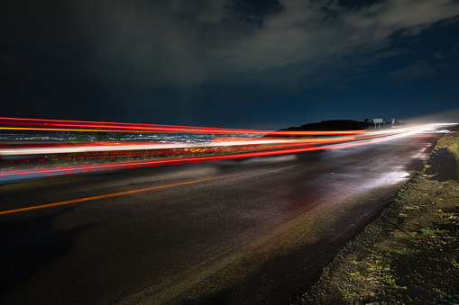 Danish highway with cars making light trails at low shutter speed