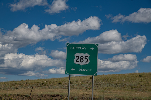 Highway sign 285 Denver and Fairplay in central Colorado in western USA of North America.