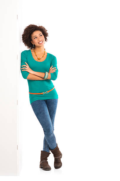 Thoughtful Woman Leaning On Wall