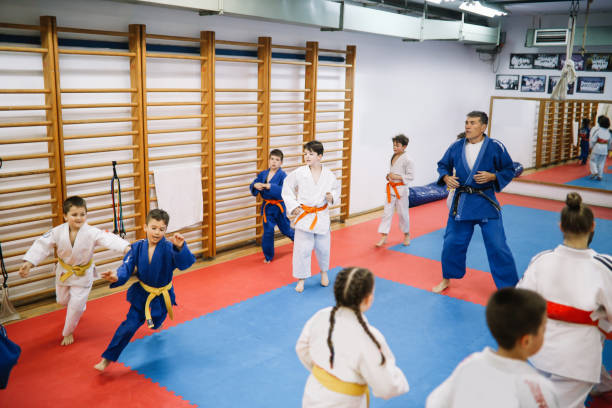 istock kids on a judo martial arts training session 1650857831