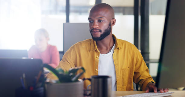 istock Information technology, research and businessman on computer, laptop and keyboard for software development, website and system update. Programming, solution and digital business man at desk in office 1650858310