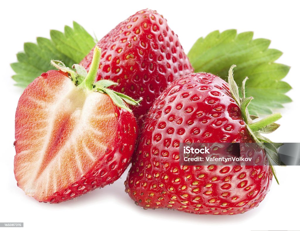 Strawberries with leaves. Strawberries with leaves. Isolated on a white background. Berry Fruit Stock Photo