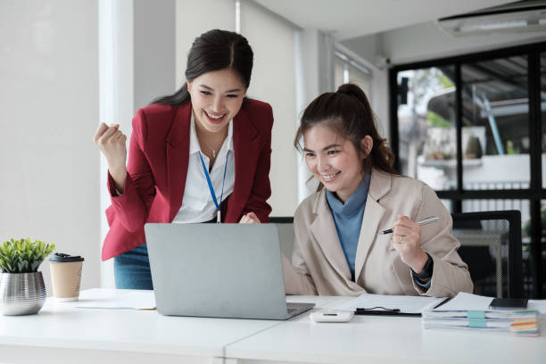 istock Smart business people working together with laptop while talking in the co working place. 1650875239