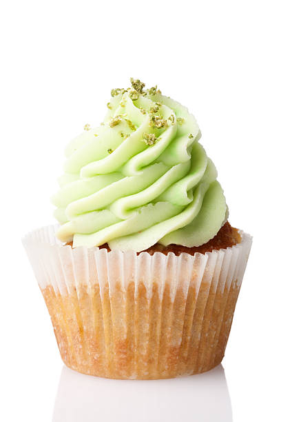 istock cupcake with green cream isolated on white background 165088422
